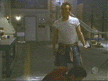 Giles standing over Ethan