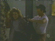 Giles helping Joyce put on the stolen jacket
