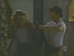 Giles helps Joyce with jacket