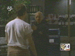 Cop points gun at Giles