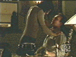 Jenny/Eyghon leans over Giles
