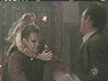 Giles and Willow double-team vampire
